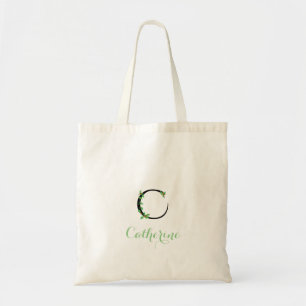 Diseño de marfil en la bolsa de tote del Monograma