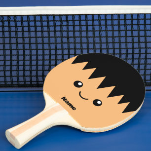 Diseño de pala de ping pong con cara de dibujos an
