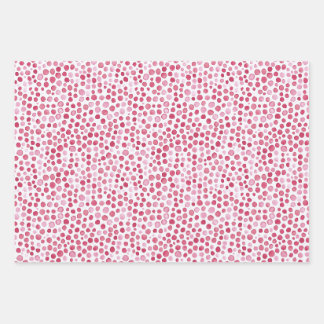 Diseño de papel de regalo con puntos rosados y pat