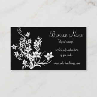 Diseño floral blanco en tarjetas de visita negras
