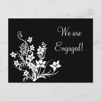 Diseño floral blanco en tarjetas postales negras