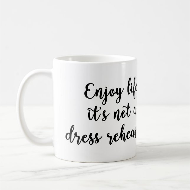 Disfrute de la vida que no es una taza del ensayo (Izquierda)