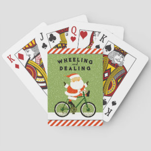 Divertidos ciclistas Navidades jugando cartas
