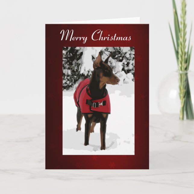 Doberman rojo en la tarjeta de Navidad de la nieve (Anverso)
