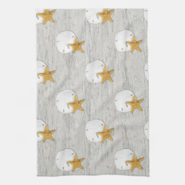 Dólar de arena y pez estrella en toalla de mano de