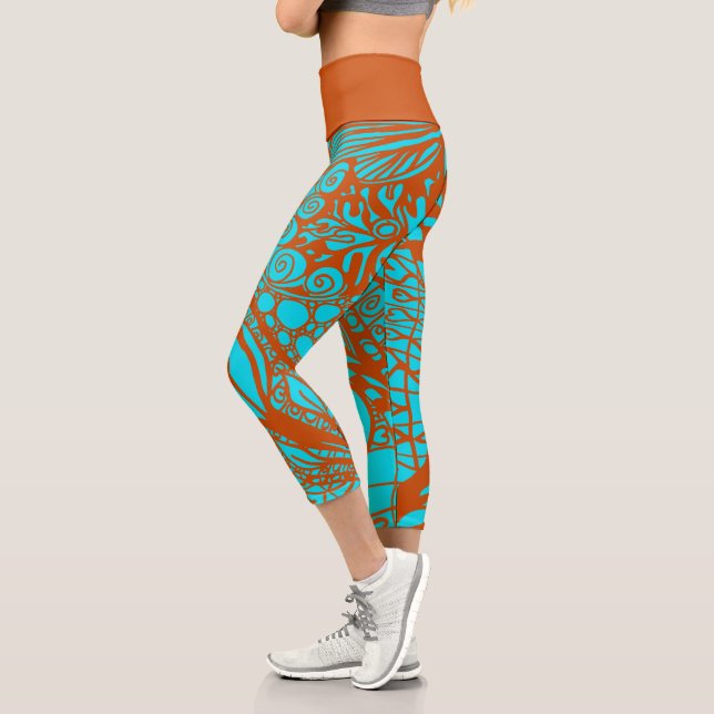 Doodle 1E Aqua Pumpkin 1 Capri Leggings (Izquierda)