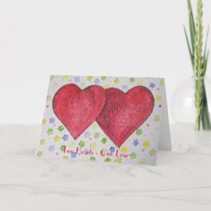 Dos corazones una tarjeta de felicitación del amor