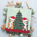 Dos Corgi Árbol de Navidad Perro Santa Sombrero<br><div class="desc">Estos hermosos perros Pembroke Welsh Corgi tienen la cabeza inclinada dentro de un lindo gorra de Santa Claus. Las dos crías están sentadas frente a un árbol de Navidad bonito decorado con adornos coloridos. Bonita tarjeta de vacaciones de corgis con un maravilloso dibujo de tricolor y un par de corgi...</div>