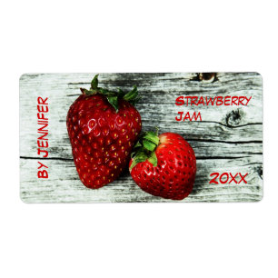 Dos etiquetas de mermelada de fresas deliscientes