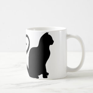 Dos gatos hacen una taza de café de silueta cardía
