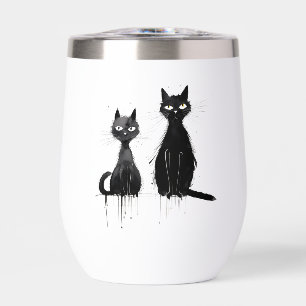 Dos gatos negros