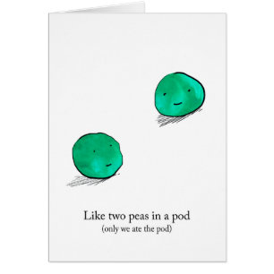 Dos guisantes en una tarjeta de la vaina