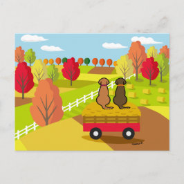 Dos labradores en el carrito de heno en la postal 