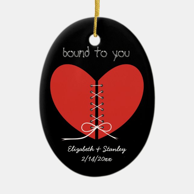 Dos mitades de un corazón atado con un ornamento d (Frente)