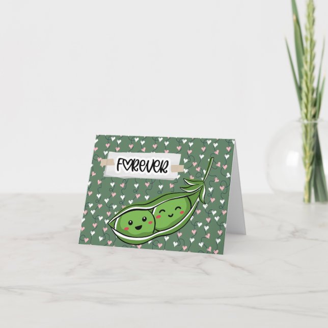 Dos peas en una tarjeta de San Valentín en blanco  (Anverso)