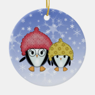 Dos pequeños pingüinos adornos navideños