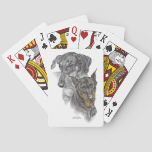 Dos perros Doberman Pinscher para jugar cartas