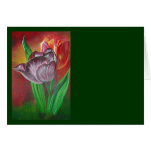 Dos tulipanes contra fondo rojo