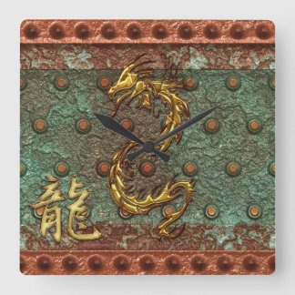 Dragón asiático y reloj de pared de kanji dorado