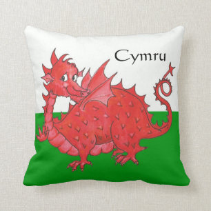 Dragón rojo lindo, almohada verde y blanca o