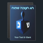 Dreidel azul brillante<br><div class="desc">Un dreidel modernista, metálico y azul sobre un fondo oscuro y nocturno. Dos de las letras hebreas encontradas en un dreidel, una monja y un shin, brillan brillantemente. El texto en hebreo que dice "Chag Chanukkah Sameach" (Feliz Hanukkah) también aparece en azul y blanco resplandeciente. Añade tu propio texto adicional....</div>