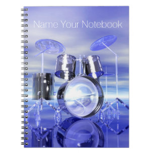 Drumset en el cuaderno de la música de la playa