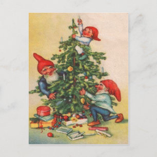 Duendes decorando el árbol de Navidad