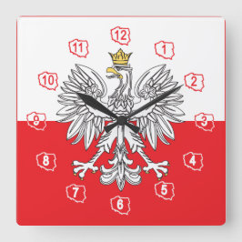 Eagle polaco con el reloj de pared de la bandera