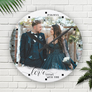 El amor crece con el reloj Boda de fotos del tiemp