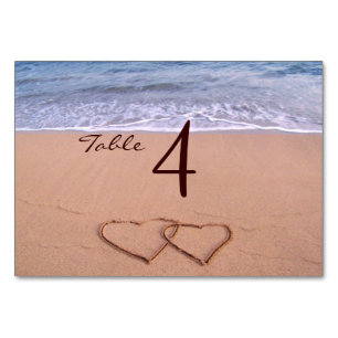 El amor en las tarjetas de mesa de la playa