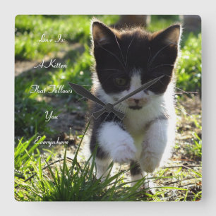 El amor es un reloj de pared del gatito