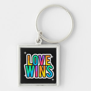 El amor gana. LGBTQ+Orgullo. Arcoíris. Llavero