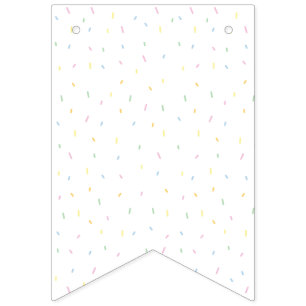 El arco iris asperja la bandera