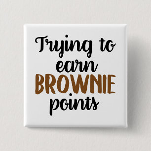 El brownie lindo de los profesores señala el botón