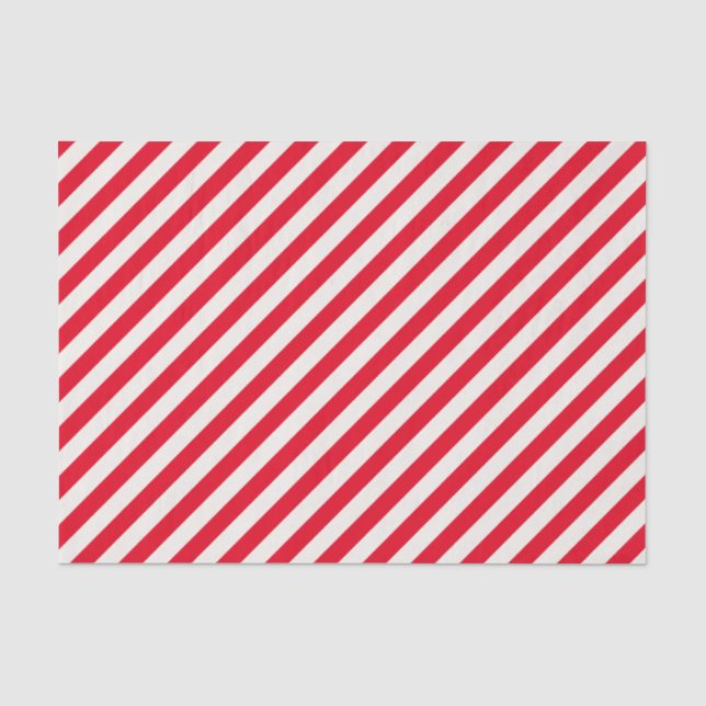 El caramelo raya el papel seda rojo del día de (Anverso)