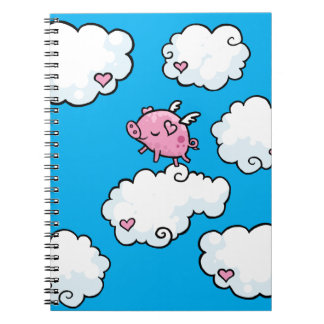 El cerdo del vuelo baila en el cuaderno espiral de