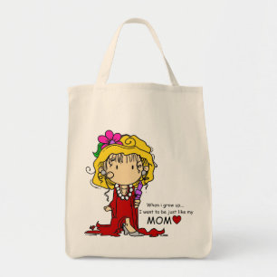 El chica apenas tiene gusto de la bolsa de asas de