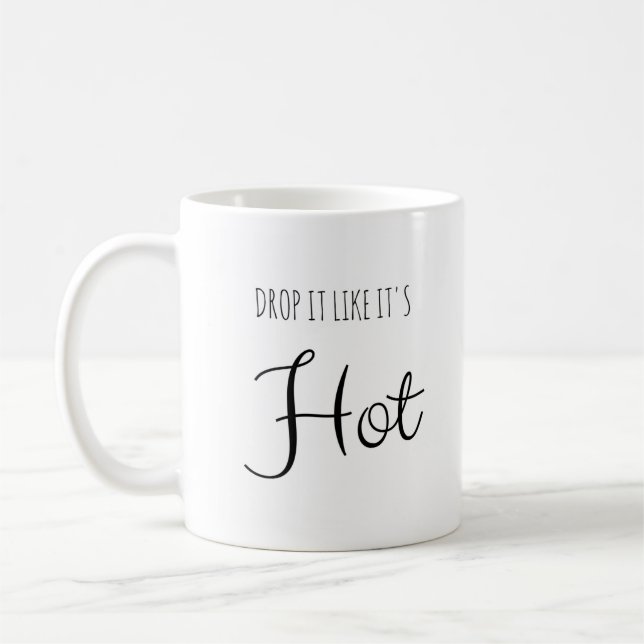 El descenso que tiene gusto de él es taza (Izquierda)