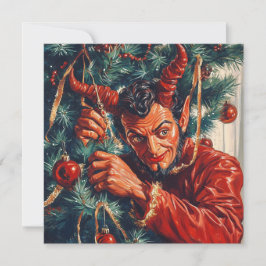 El diablo decora el árbol de navidad