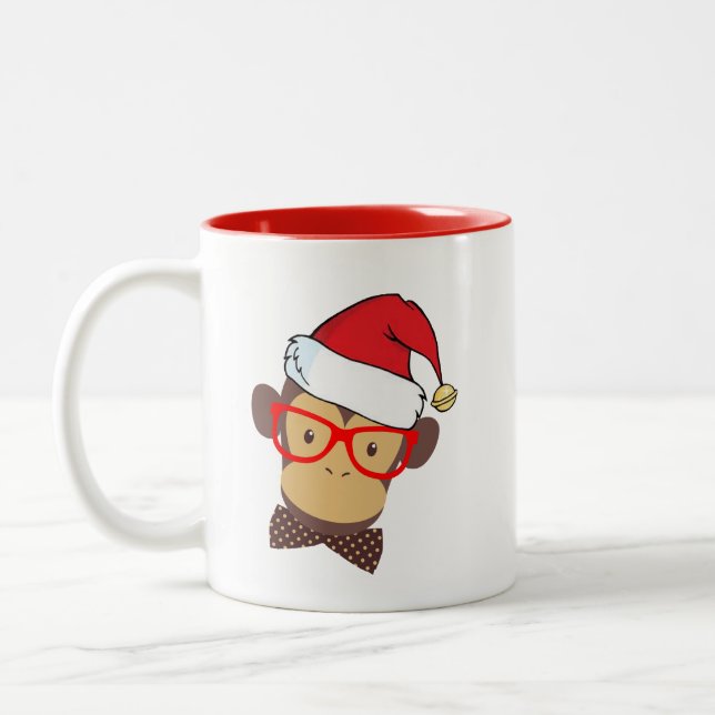 El diseño de tazas de Navidades graciosos de monos (Izquierda)