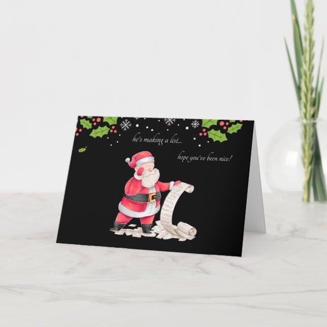 Él está haciendo una tarjeta de Navidad con una li (Anverso)