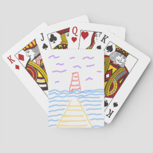 El faro y las cartas de juego clásicas del muelle