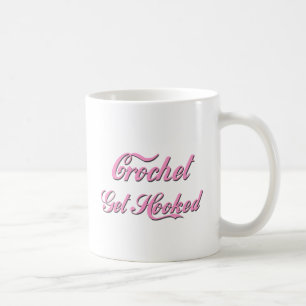 El ganchillo consigue la taza de café enganchada