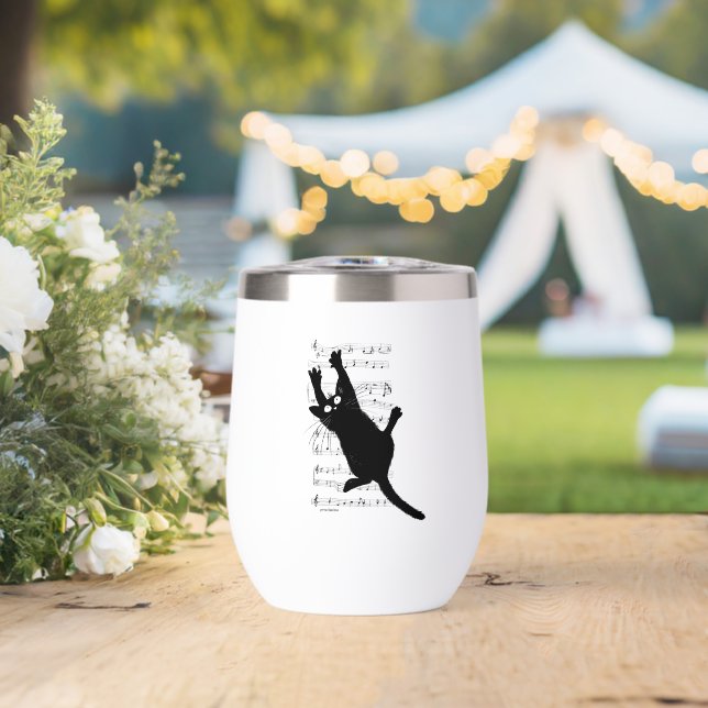 El gato cuelga de notas musicales (Boda (girada))