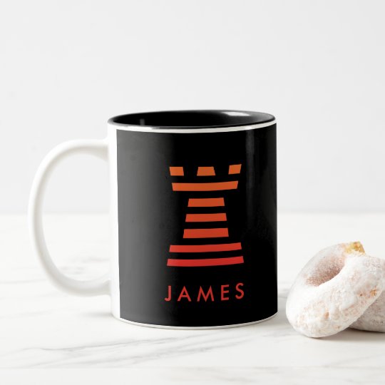 El grajo del ajedrez de la taza del negro del