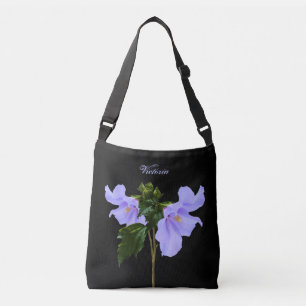 El hibisco azul florece las bolsas de asas negras