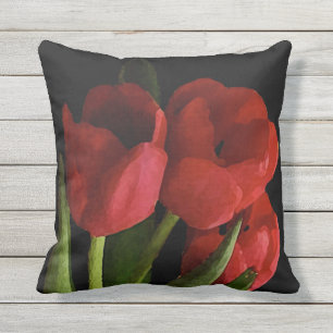 El jardín rojo del tulipán florece la almohada a