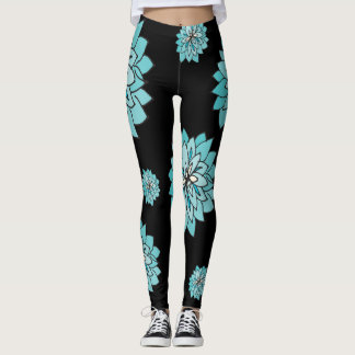 El legging negro con diseño floral azul verde