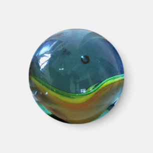 El mármol de cristal claro efectúa el imán