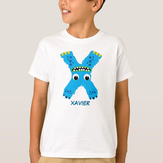 El monstruo pone letras a la camiseta (letra X) (Anverso)